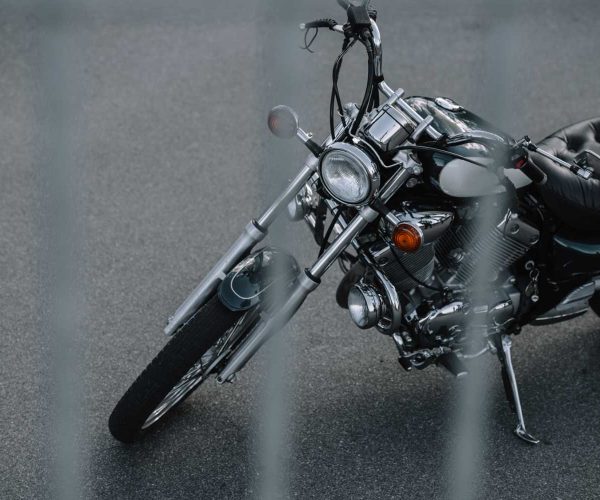 classic cruiser motorcycle standing on asphalt road