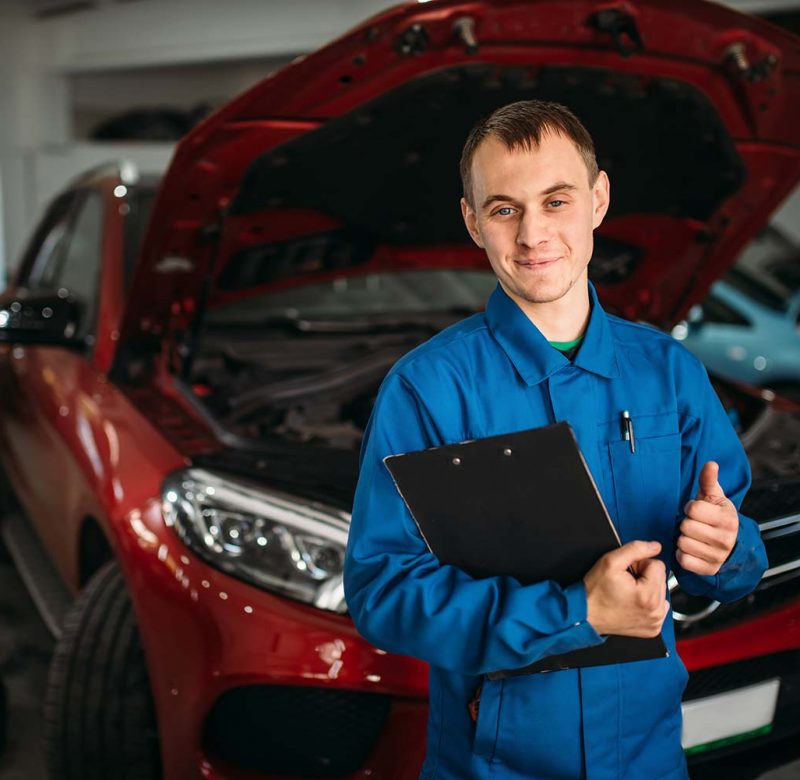technician-with-notebook-car-with-opened-hood-small